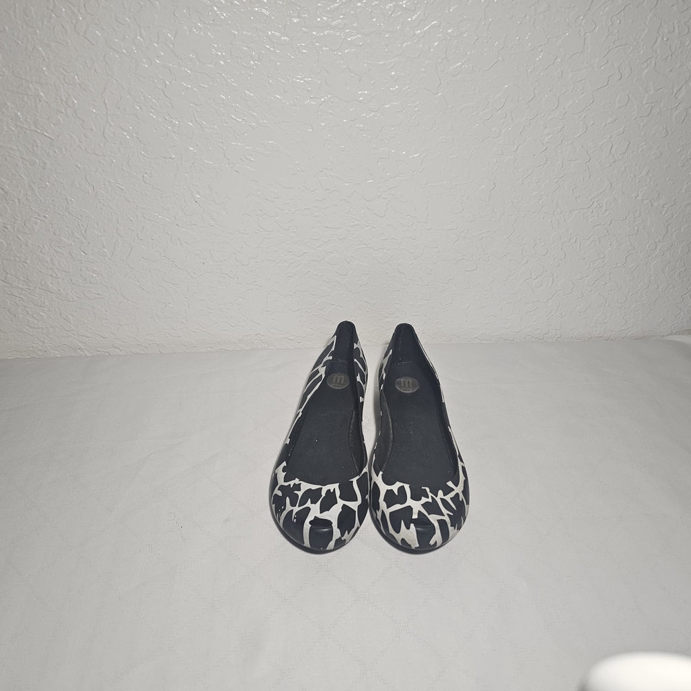 Melissa white and black animal print flats